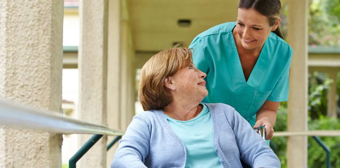 woman taking care of disabled person