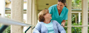 woman taking care of disabled person